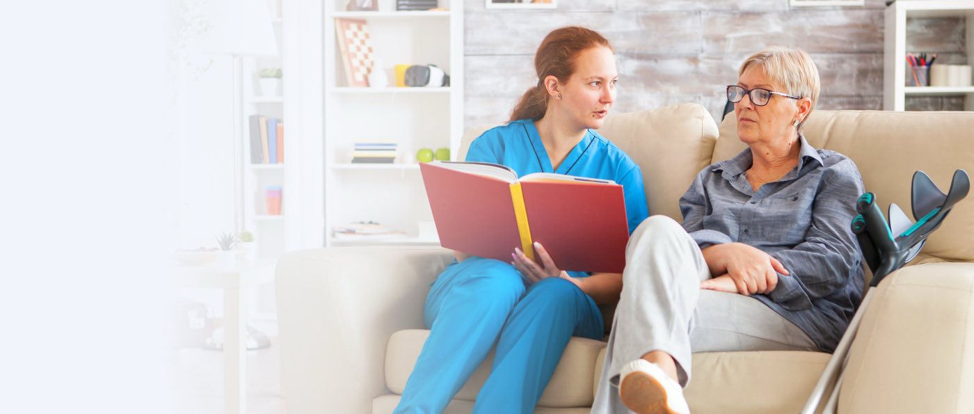 Caregiver reading for elderly